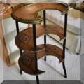 F11. Three tiered marquetry side table. 